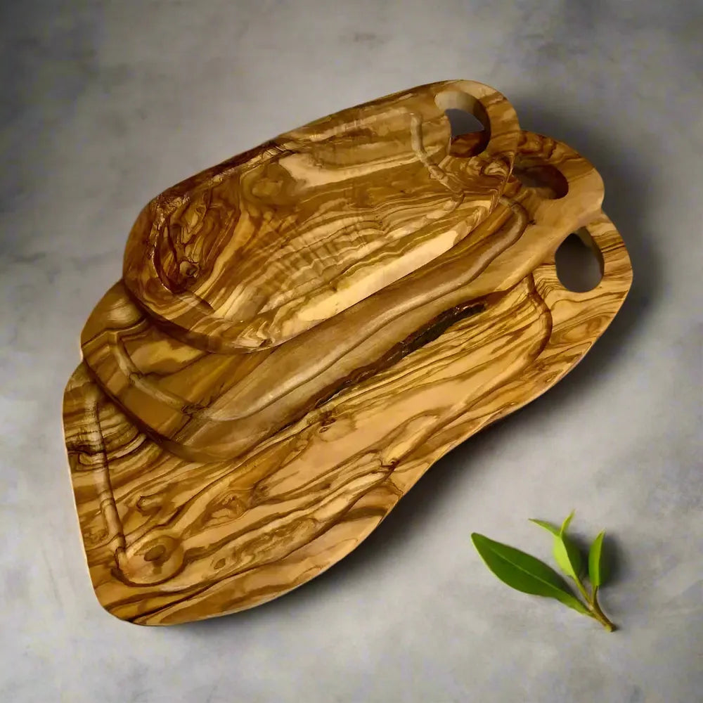 Olivenholz Schneidebrett mit Saftrille & Grifflasche