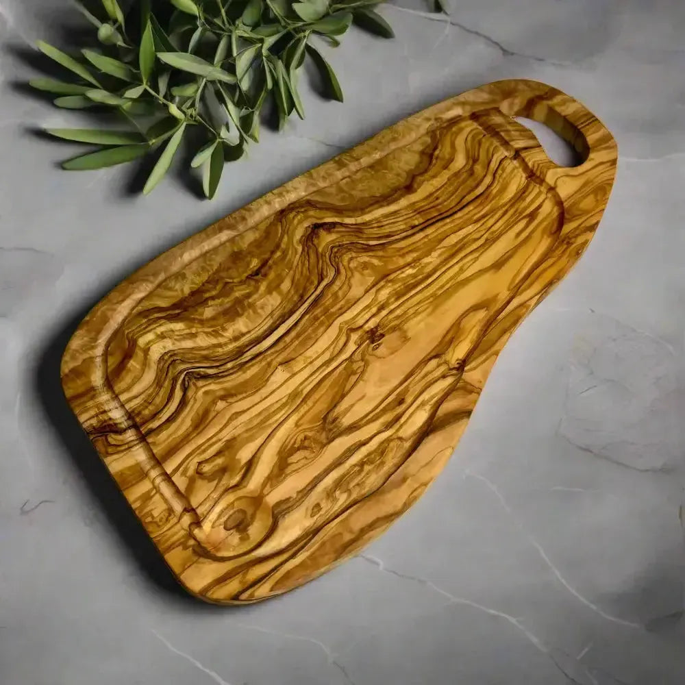 Olivenholz Schneidebrett mit Saftrille & Grifflasche