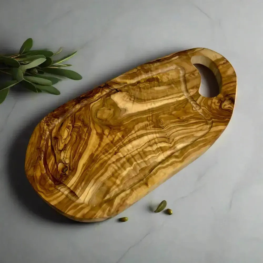 Olivenholz Schneidebrett mit Saftrille & Grifflasche